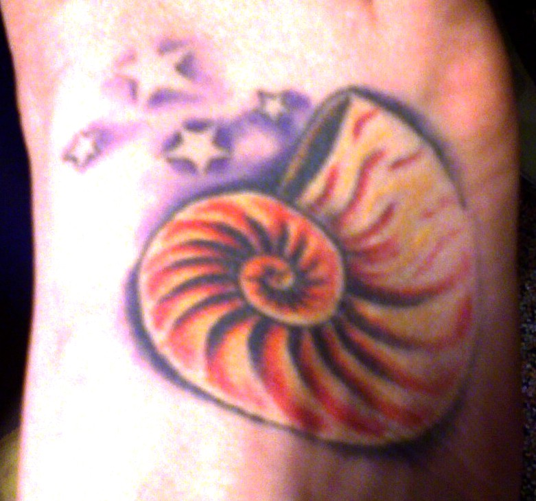 shell tattoo. My first tattoo was July 27,